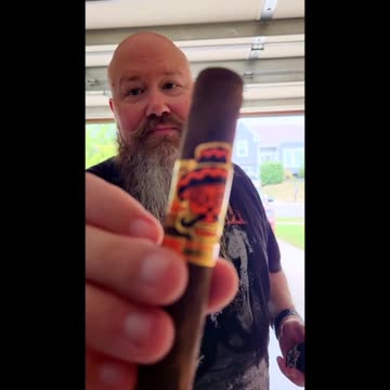 Cut and Light a Rojas Street Taco Cigar