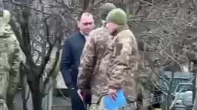 Ukrainan recruitment officers patrol the streets hunting for.......