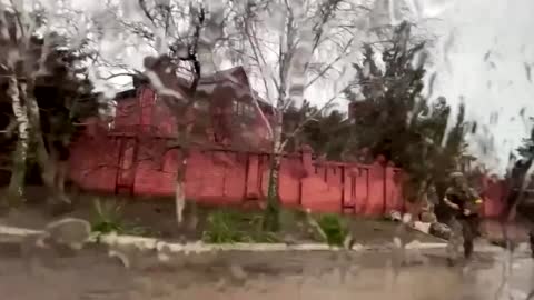 Ukrainian soldiers seen taking up position in Mariupol