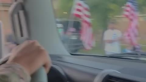 Neighbors Welcome Home Soldier With Street Of Flags