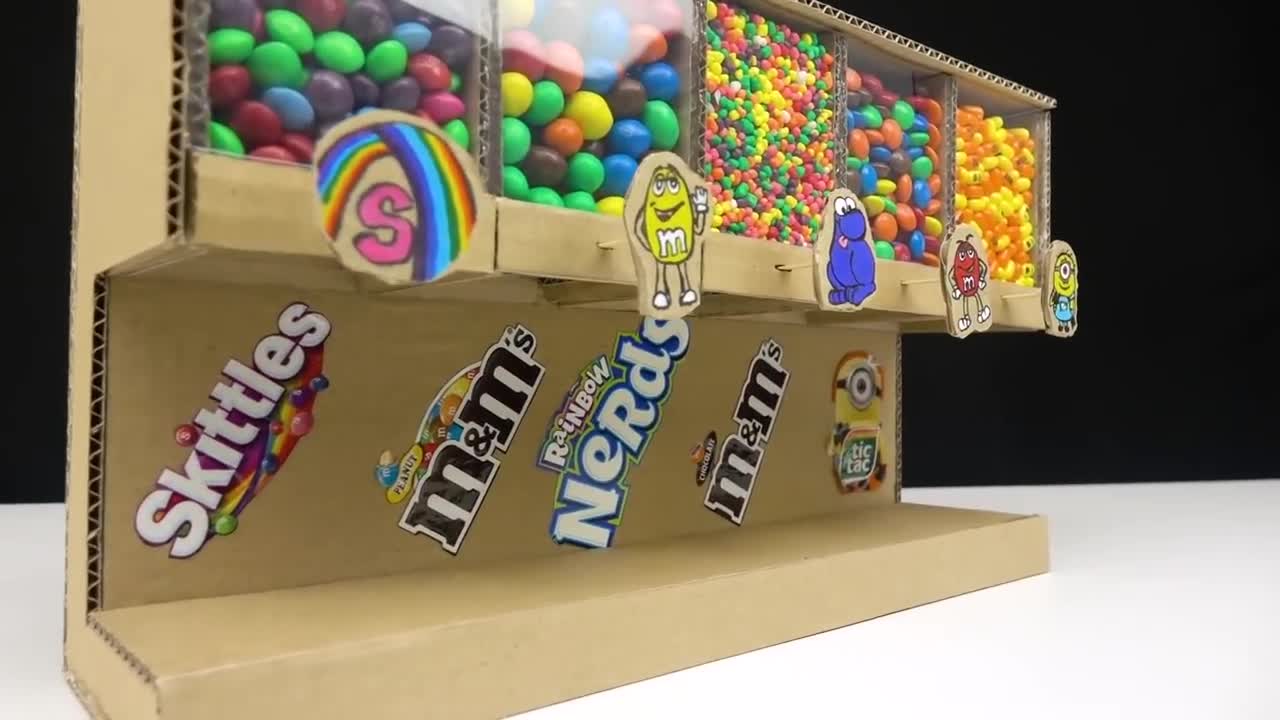 Smart Girl Shows How to Build Candy Dispenser