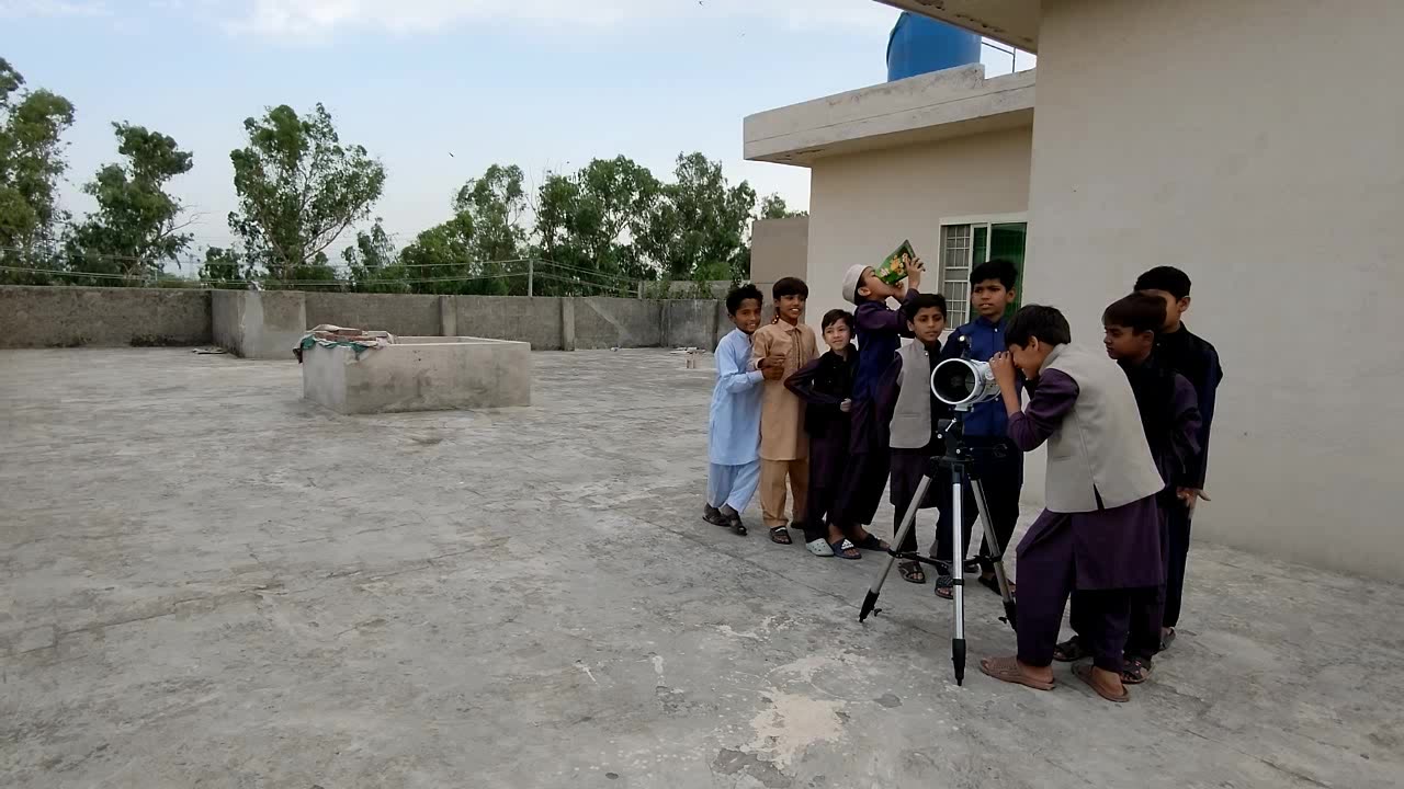 Children enjoying views from telescope