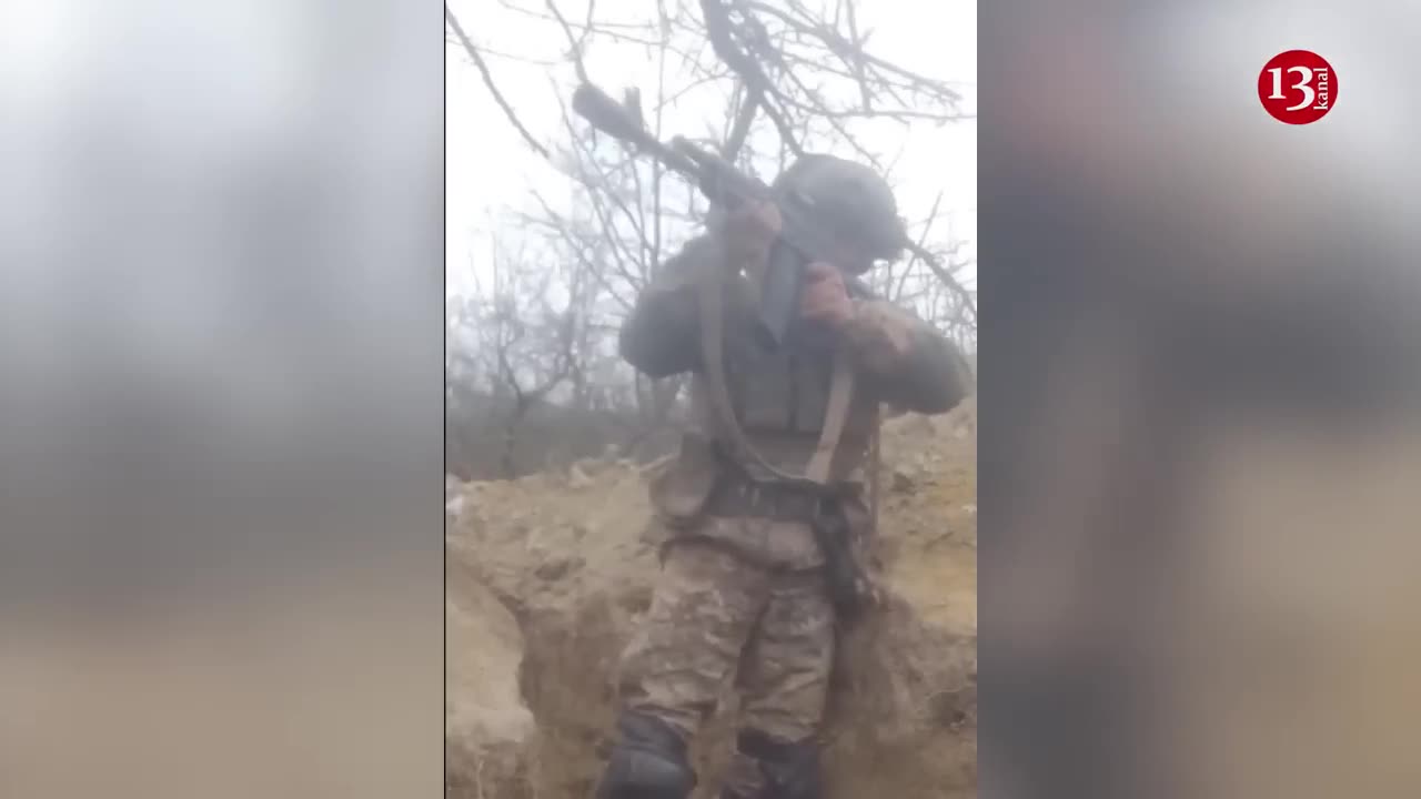 Ukrainian soldier fighting against Russians in the trench alone