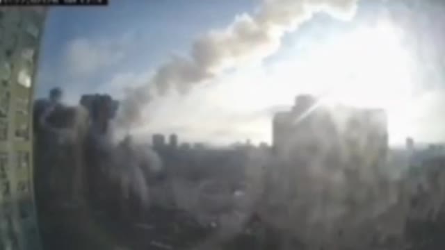 Video of a Ukrainian shell hitting a residential building in Zhuliany near Kiev