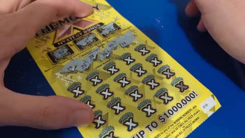 Ga lottery ticket scratching