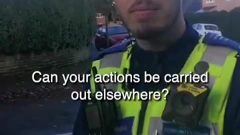 Women interrogated by the UK Police standing on a street praying silently in her head.