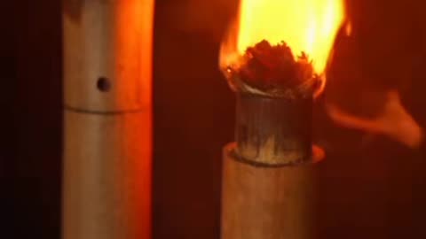 A small bamboo tube holding a spark that can be easily ignited