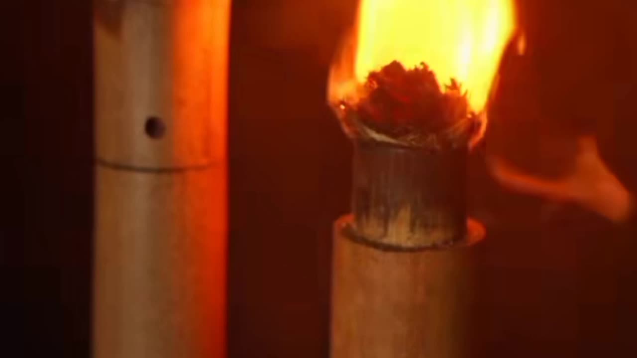 A small bamboo tube holding a spark that can be easily ignited
