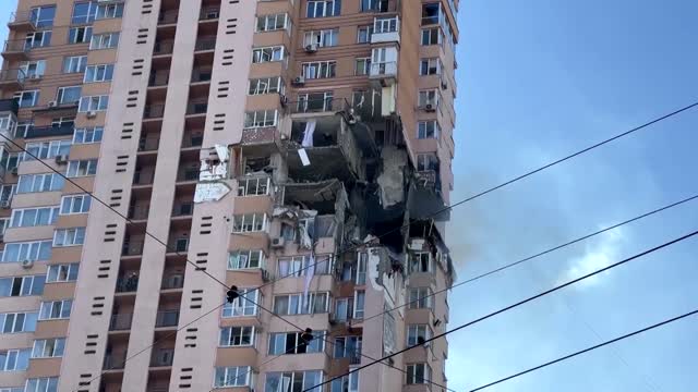 Moment rocket strikes Kyiv apartment block