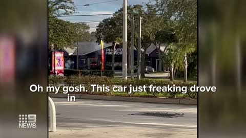 Flames engulf Florida fireworks store after car crashes into building