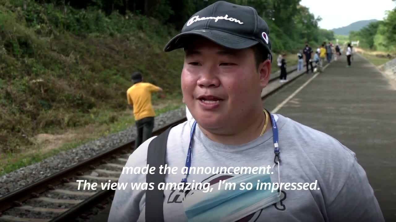 Thailand's 'floating train' a hit as dam waters rise