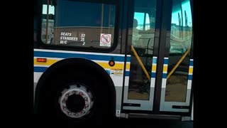 Suffolk county transit new flyer hybrid bus departing sunrise mall bus terminal