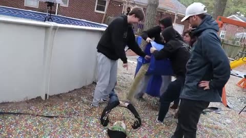 I put 100 million orbeez in my friend's backyard