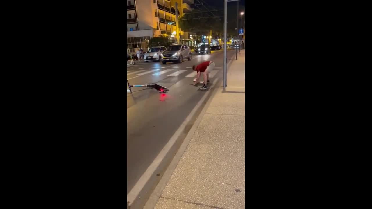 Dude on scooter tries to perform stunt, goes horribly wrong