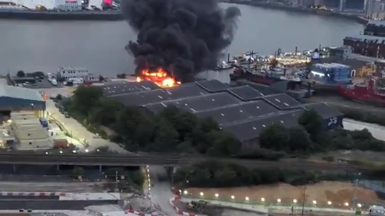 HUGE FIRE ERUPTS NEAR LONDON’S O2 ARENA AFTER EXPLOSIONS