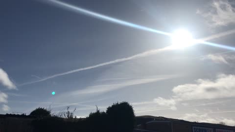 White lines on sky Wales 12:12 21/02/2023