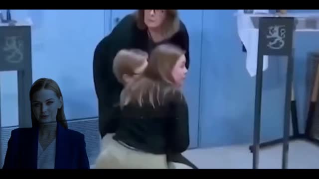 Finland's Interior Minister Krista Mikkonen pass out on live