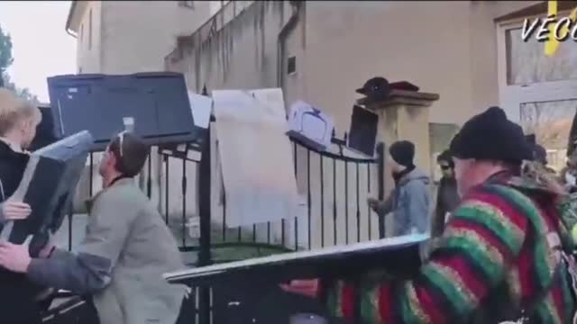 French citizens tossing their Tel-Lie-Vision TVs at the homes of corrupt politicians.
