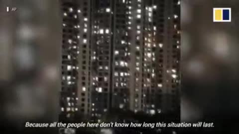 Shanghai China, people screaming from their balconies after being locked down for over a week.