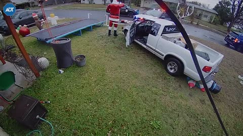 Police Chase Through Christmas Decorations