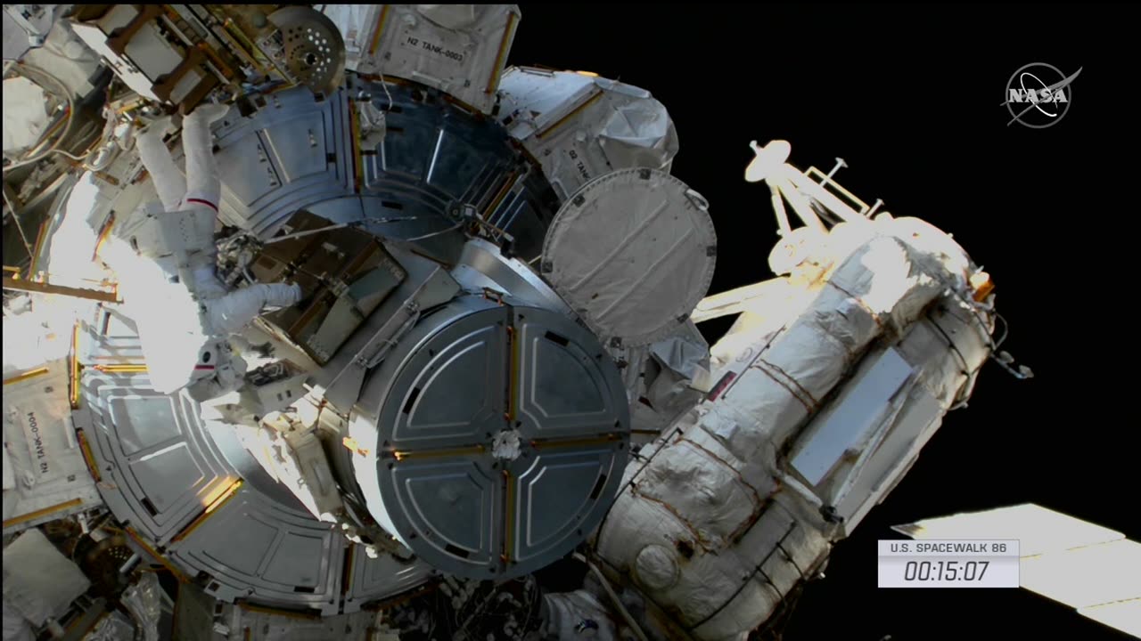 Astronauts perform space walk ahead of solar panel upgrade