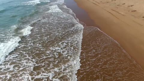 Drone Footage Of Waves Rushing To The Shore