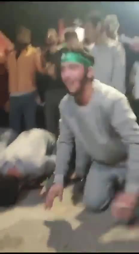 Prisoners After Being Released By Israel… Wearing Hamas Symbol