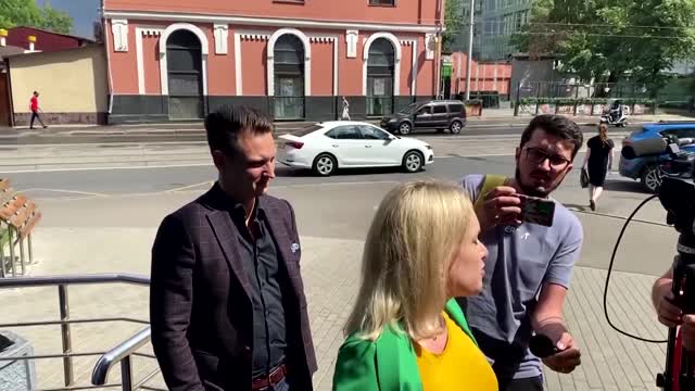 Russian TV worker arrives in court after protest