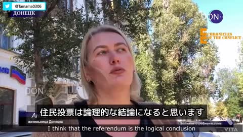 ロシア編入への住民投票を歓迎するドンバスの人々