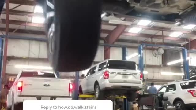 Technical guy installs tires.