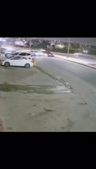 A car driver prevents another vehicle from Hitting a kid