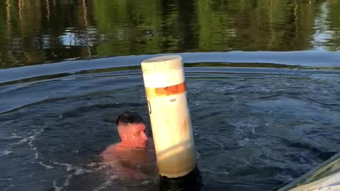 Daughter Convinces Dad to Try and Stand on Buoy