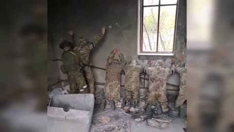 Russian Soldiers take Ukrainian Prisoners