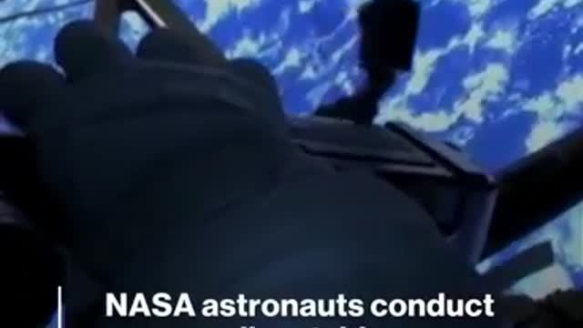 NASA astronauts conduct spacewalk outside the International Space Station