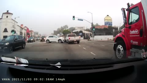 White Audi Abruptly Turns Left Into Oncoming Traffic Causing a Crash