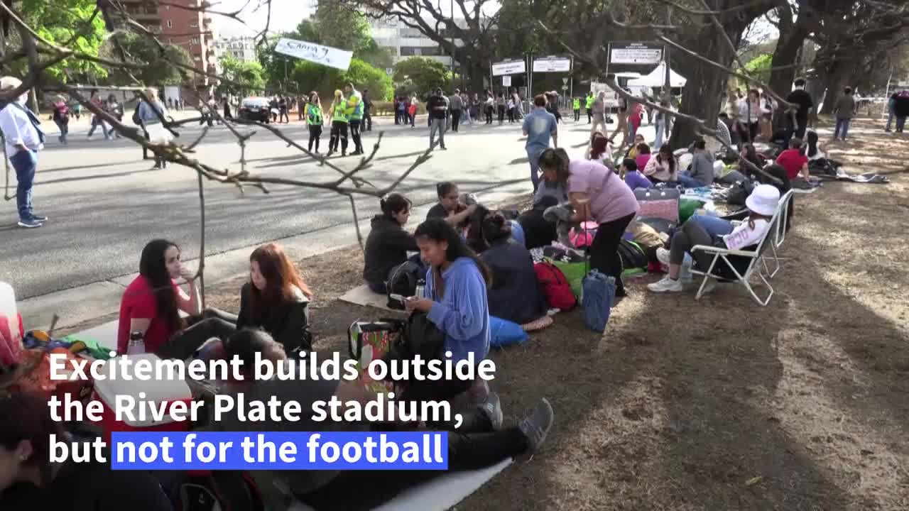 BTS fans camp out to see superstar Jin perform with Coldplay | AFP