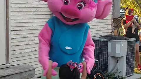 Houston mascot party character dances with a new friend in Pasadena, Texas