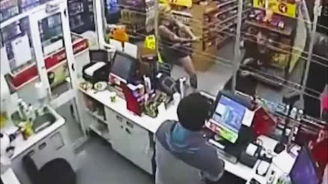 Transgender attacks a man and a woman with an axe for no reason at a 7-11..