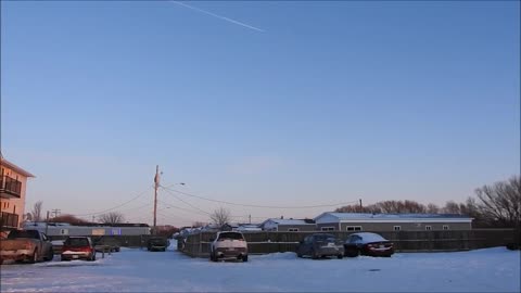 WestJet flight 1346 WPG-ORL with Moon and Sunset.