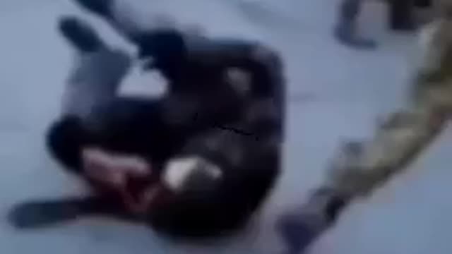 Russian prisoners shot in the leg