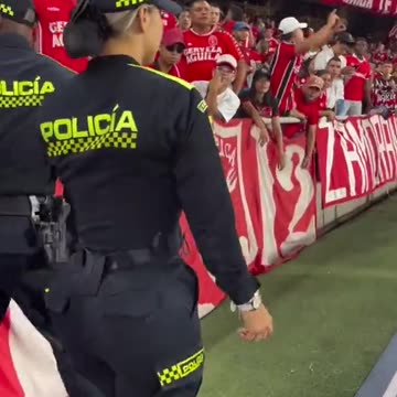 Colombian police woman leaves fans stunned at soccer match