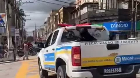 motorbike rider hits pick up and ands up in the back of it