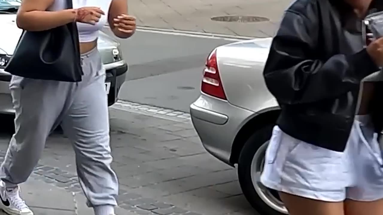 Shocked girls in public prank bushman