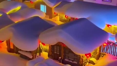 The Chinese landscape lights up the snow-covered city