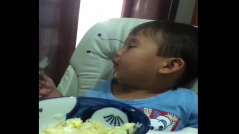 sleepy child, eat or sleep? very cute