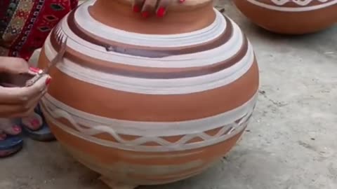 Clay pot is being designed