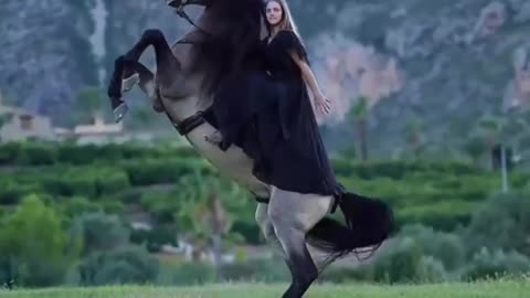 Girl riding horse