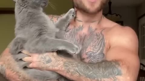 My cat takes and beats me when I sing to him