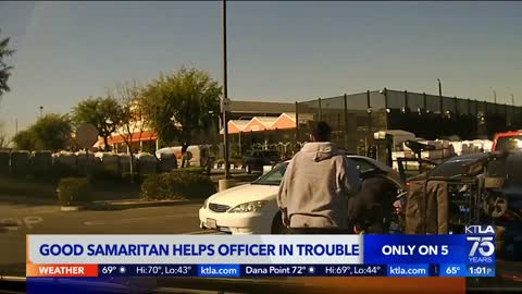 Good samaritan helps officer in trouble