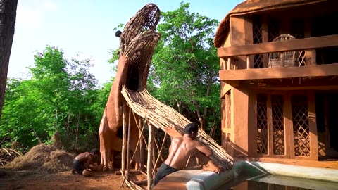 Build a dinosaur water slide and creatively colors mud house